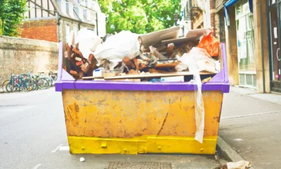 Builders skip full of renovation waste, showing what size skip a project needs