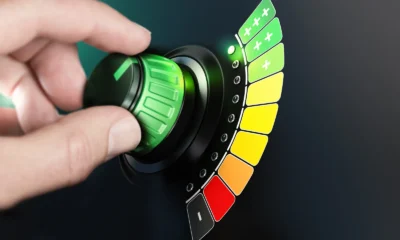 Hand turning an energy efficiency rating dial