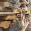 Firewood logs stacked on shelves in a shop