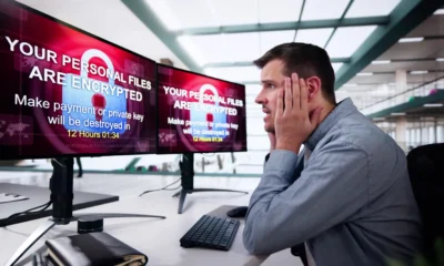 Man worried by a security warning on his computer screen